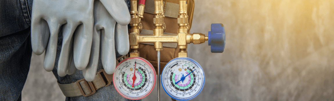 gauges and gloves on worker