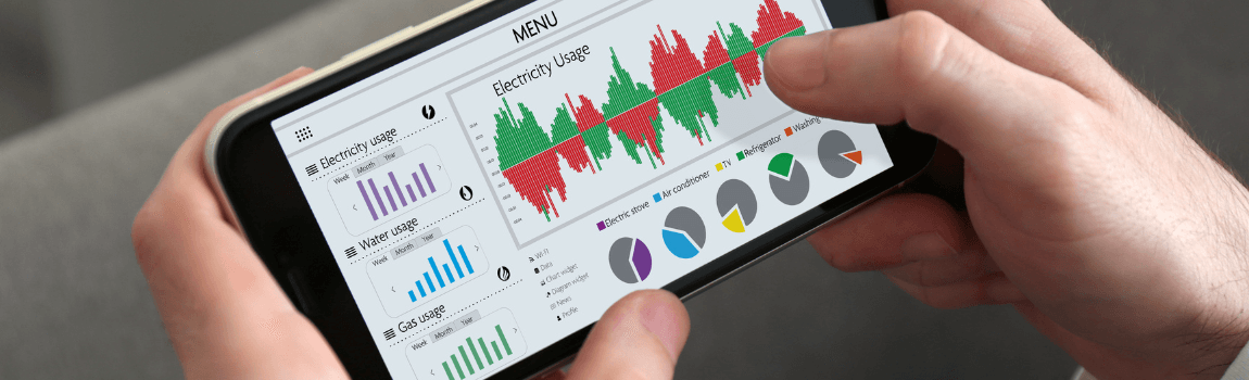 hand holding mobile phone with utility usage on screen